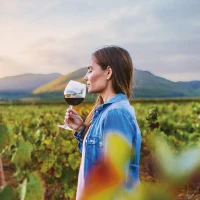 Woman smelling wine