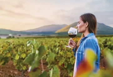 woman tasting wine front page
